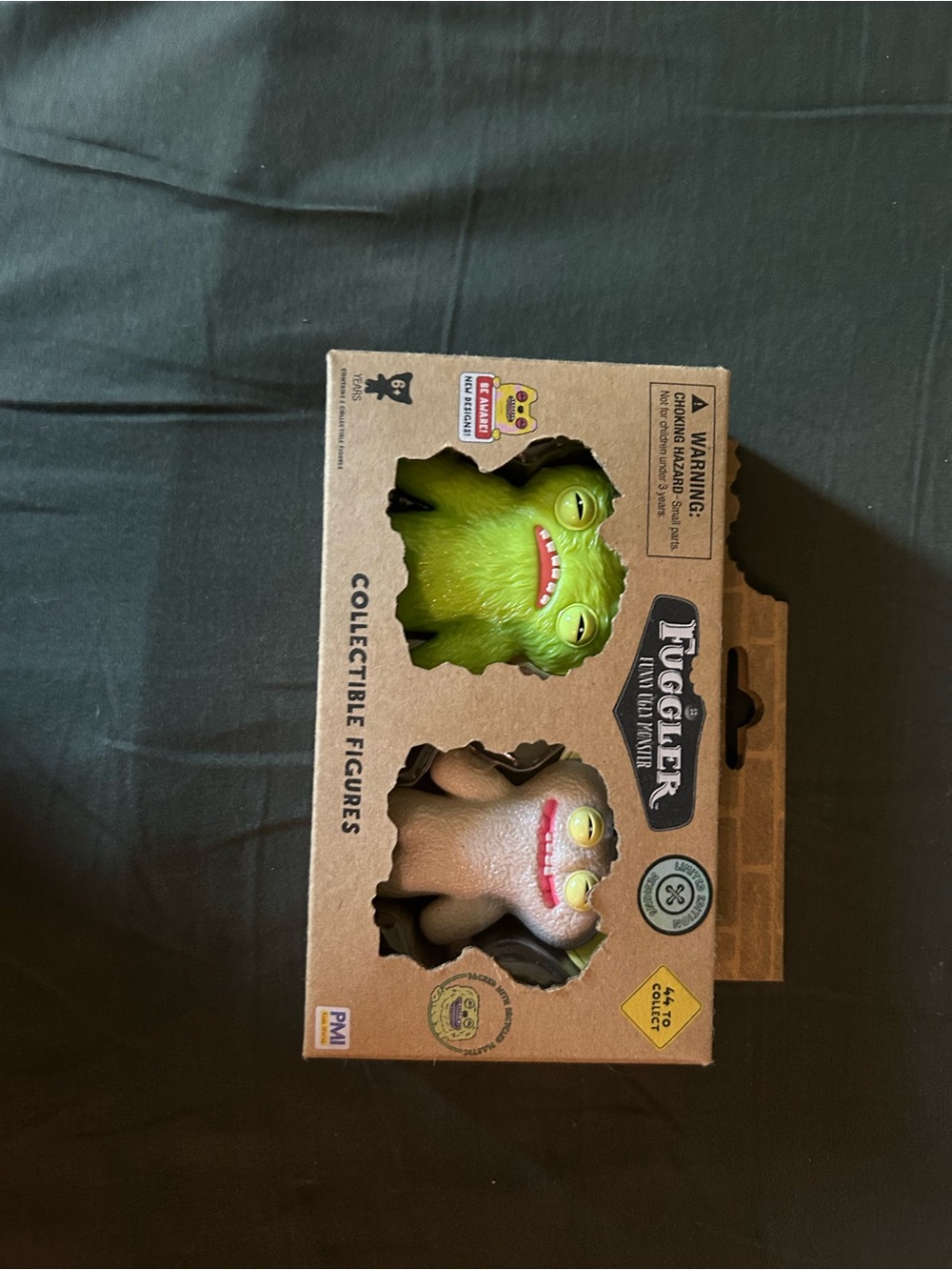 Tuggler Collectible Figures - Green & Brown Monster Duo
